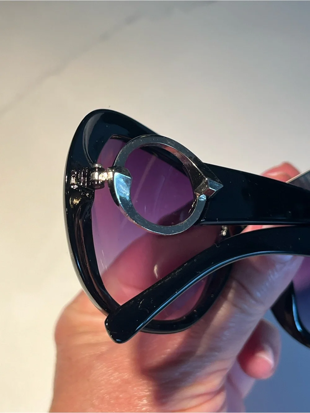 NWT fabulous oversized black sunglasses with violet lenses.